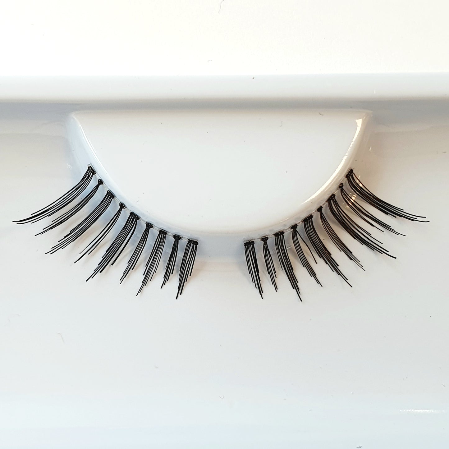 GRIMAS Irtoripset 129 (kaksi paria puolikkaita irtoripsiä)