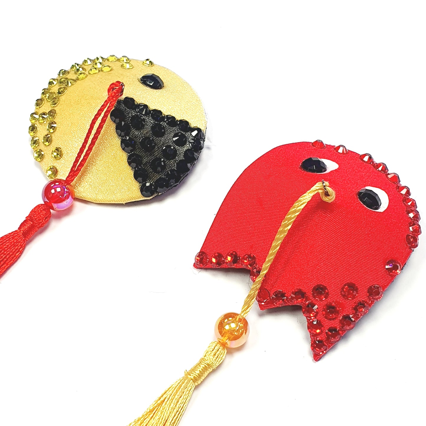 Cora Garnet tasselit Pacman