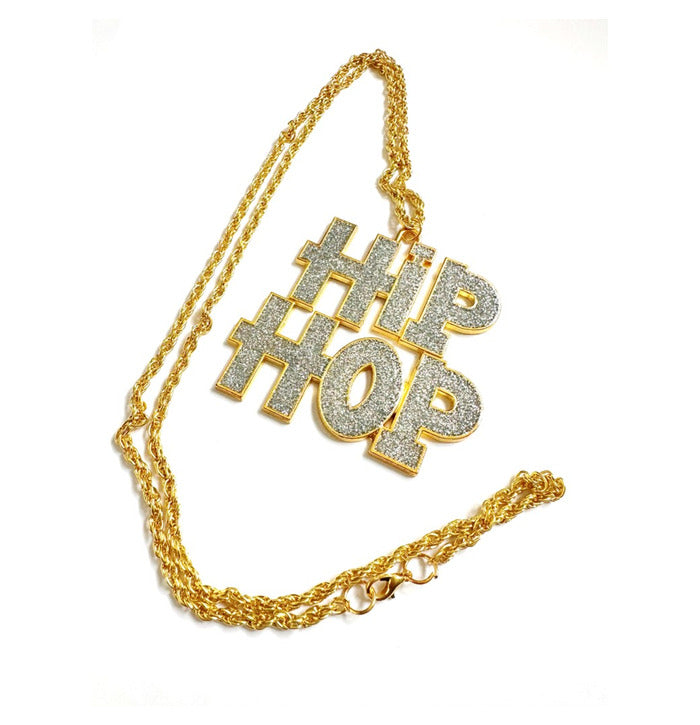 Kullanvärinen riipus hopeaglitterillä Hip Hop